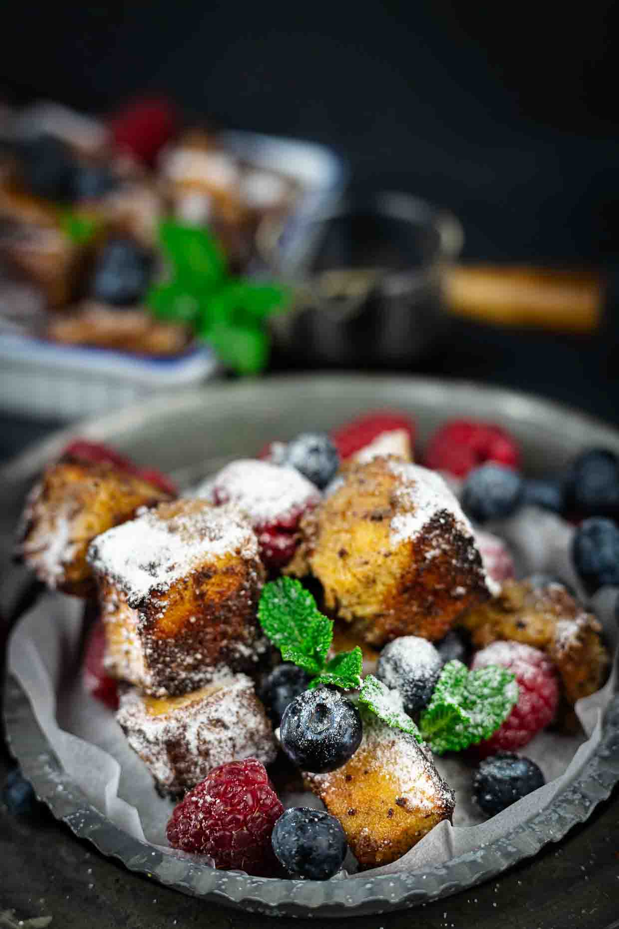 French Toast Pudding served with berries.