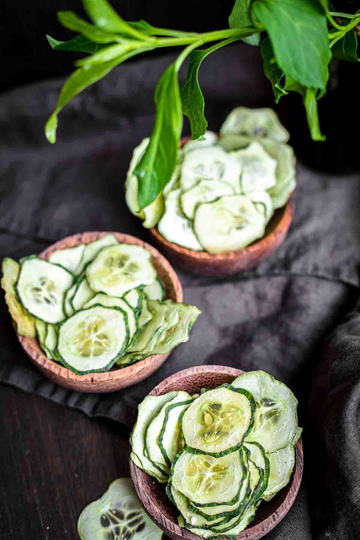 Cucumbers Snack inside wooden bowls.