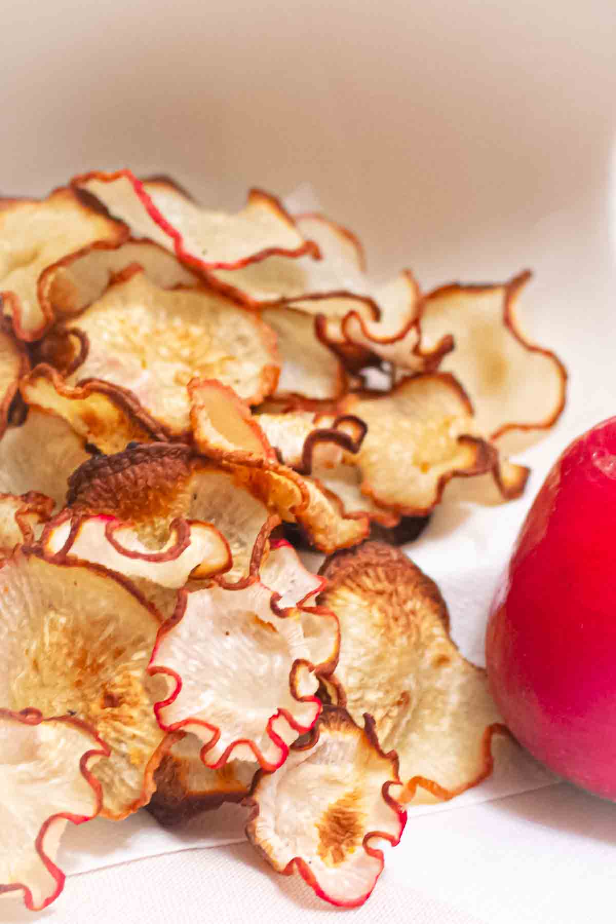 Sliced radishes on a white plate.