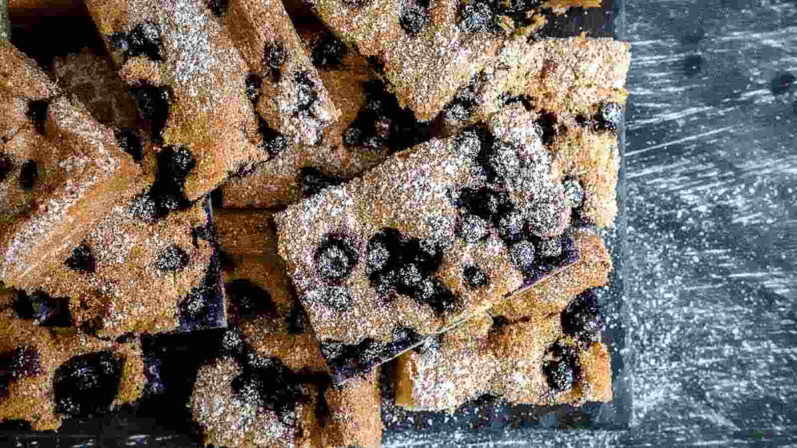 Pieces of sheet cake on top of each other.