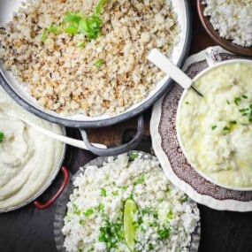 A variety of cauliflower rice dishes are shown, each garnished differently.