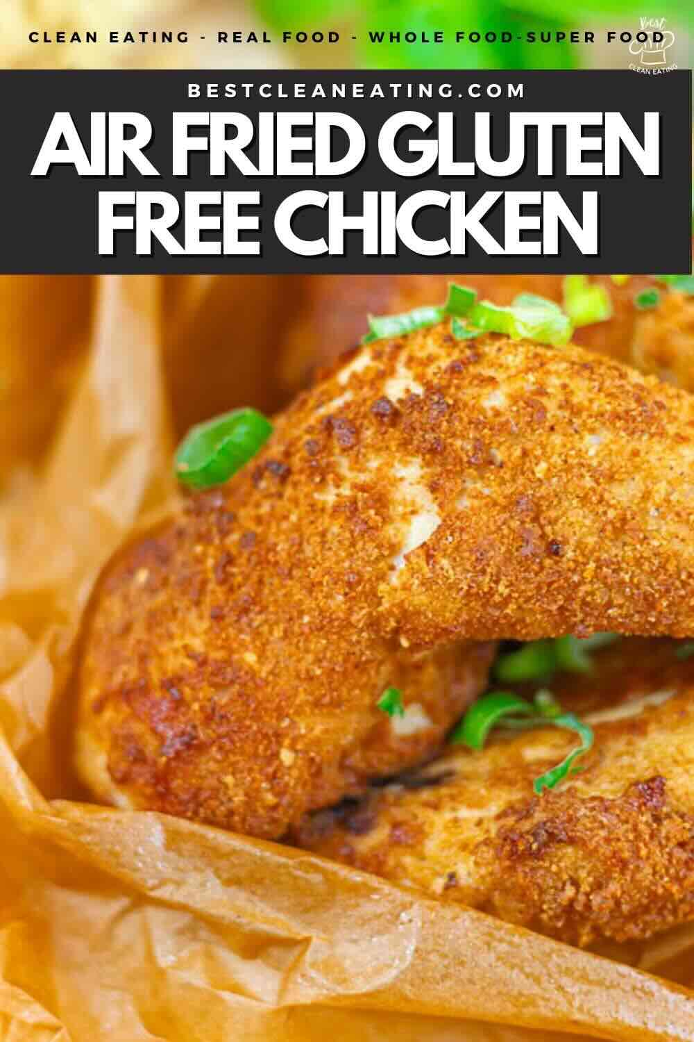 Close-up of air fried gluten free chicken pieces on brown parchment paper, garnished with chopped green onions. Text overlay promotes clean eating and gluten free recipe.