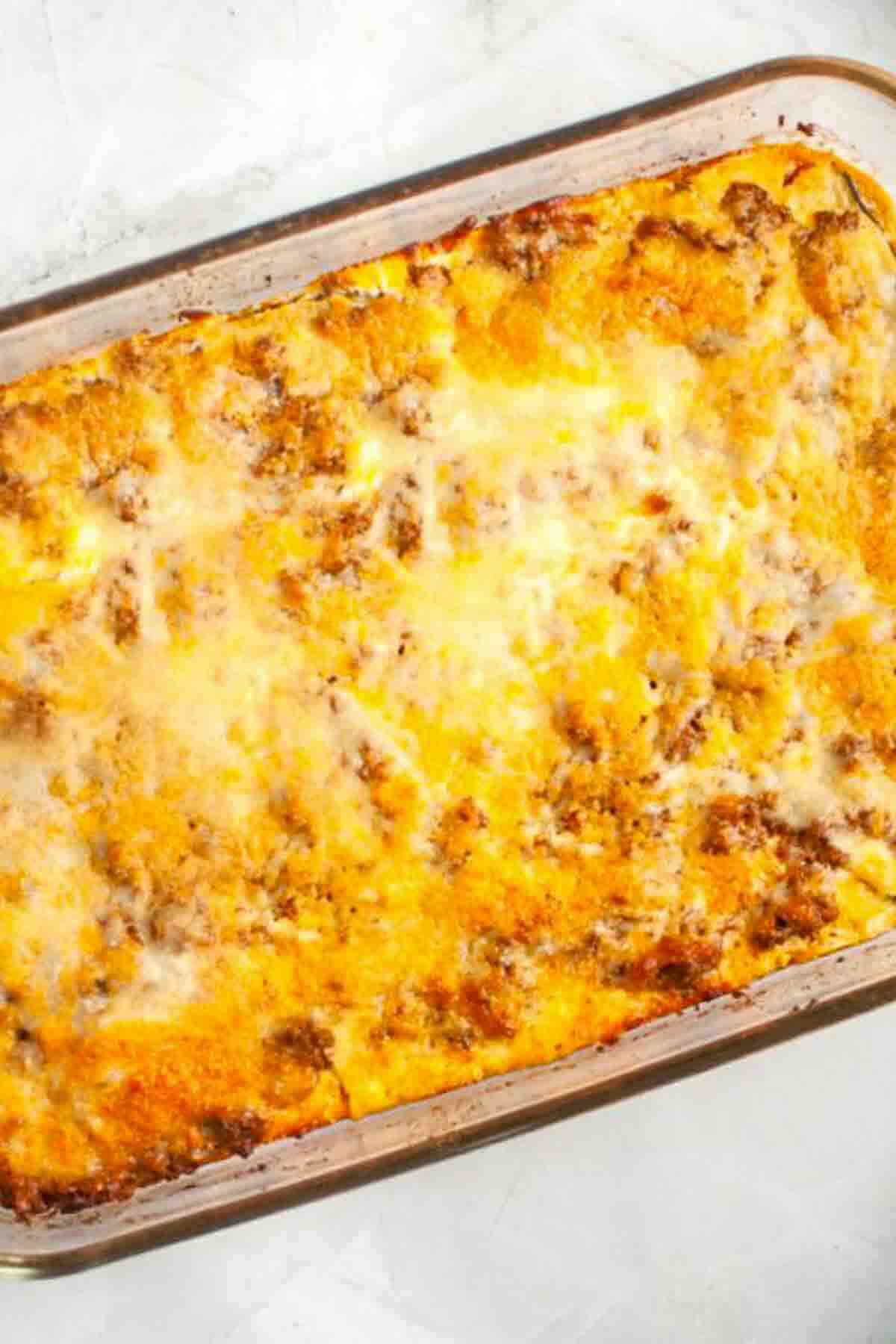 Zucchini casserole with browned cheese and sauce.