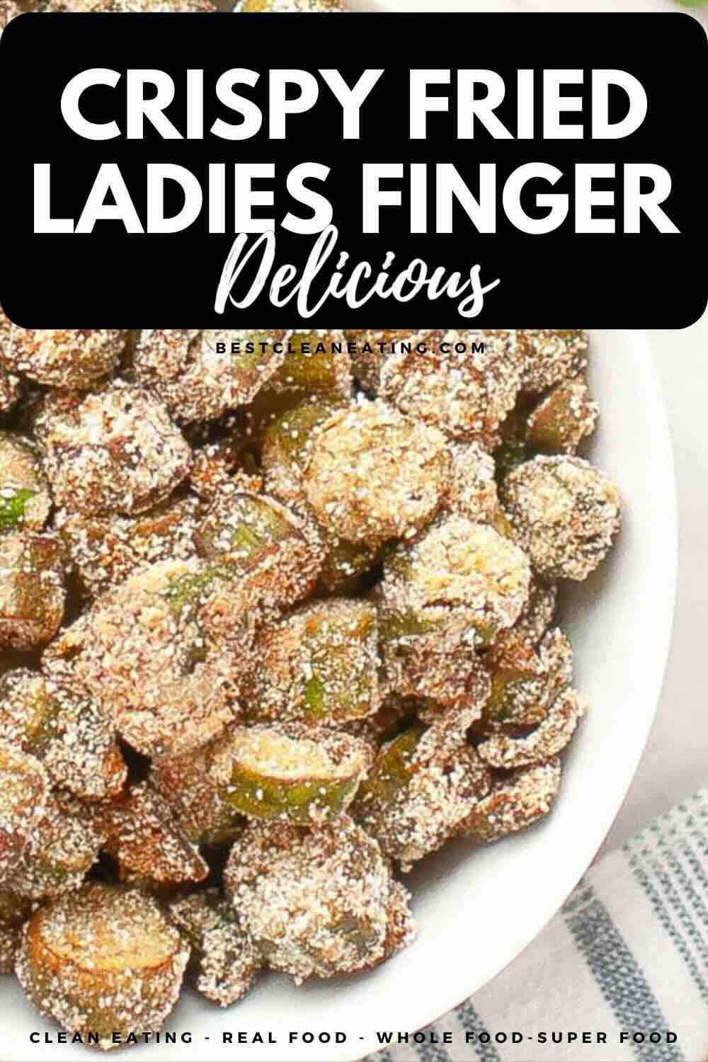 A white bowl filled with crispy fried okra pieces coated in a seasoned batter, placed on a light-colored surface.