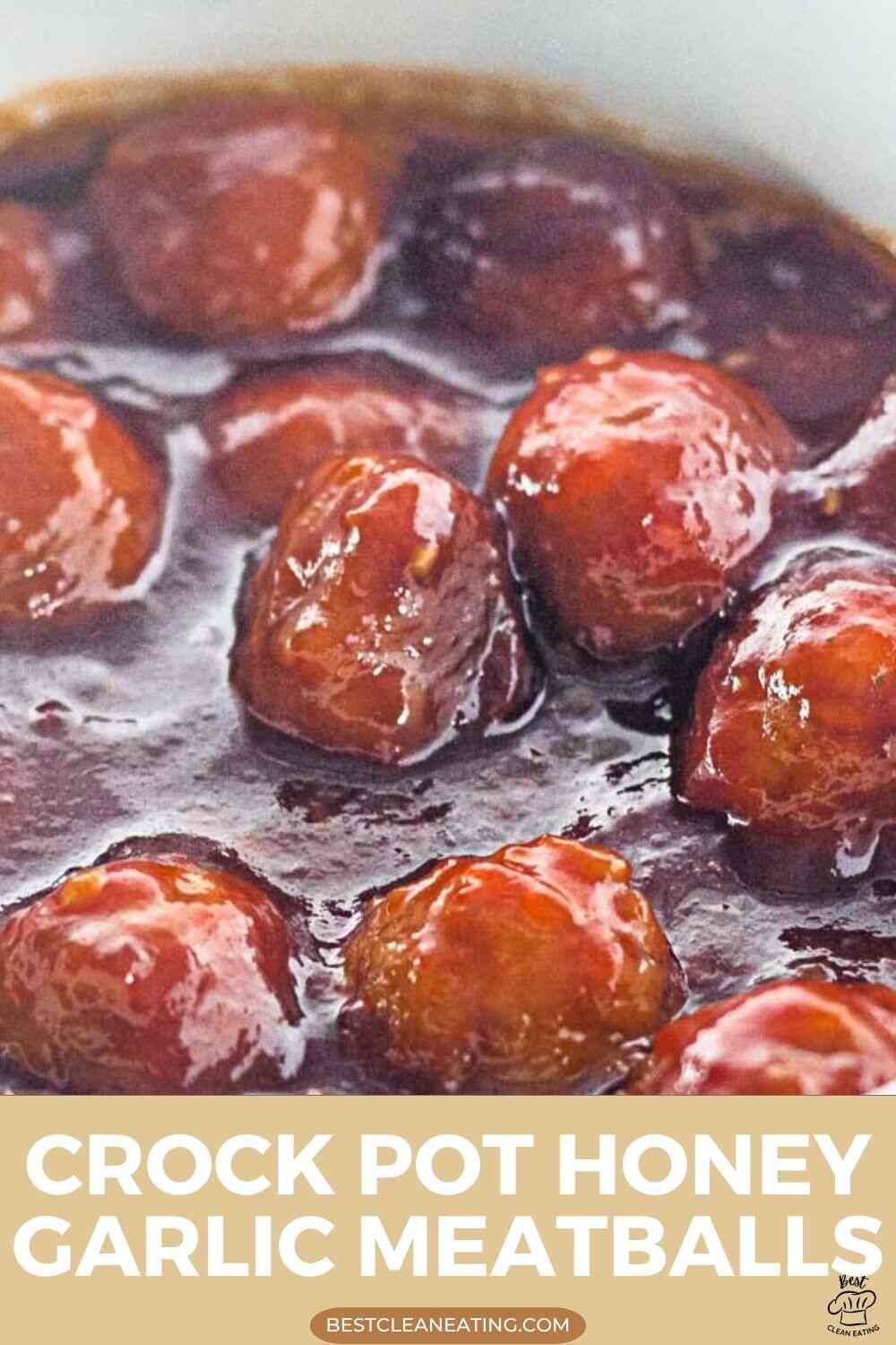 Meatballs coated in a glossy honey garlic sauce inside a crock pot, with a text label at the bottom reading “Crock Pot Honey Garlic Meatballs.”.